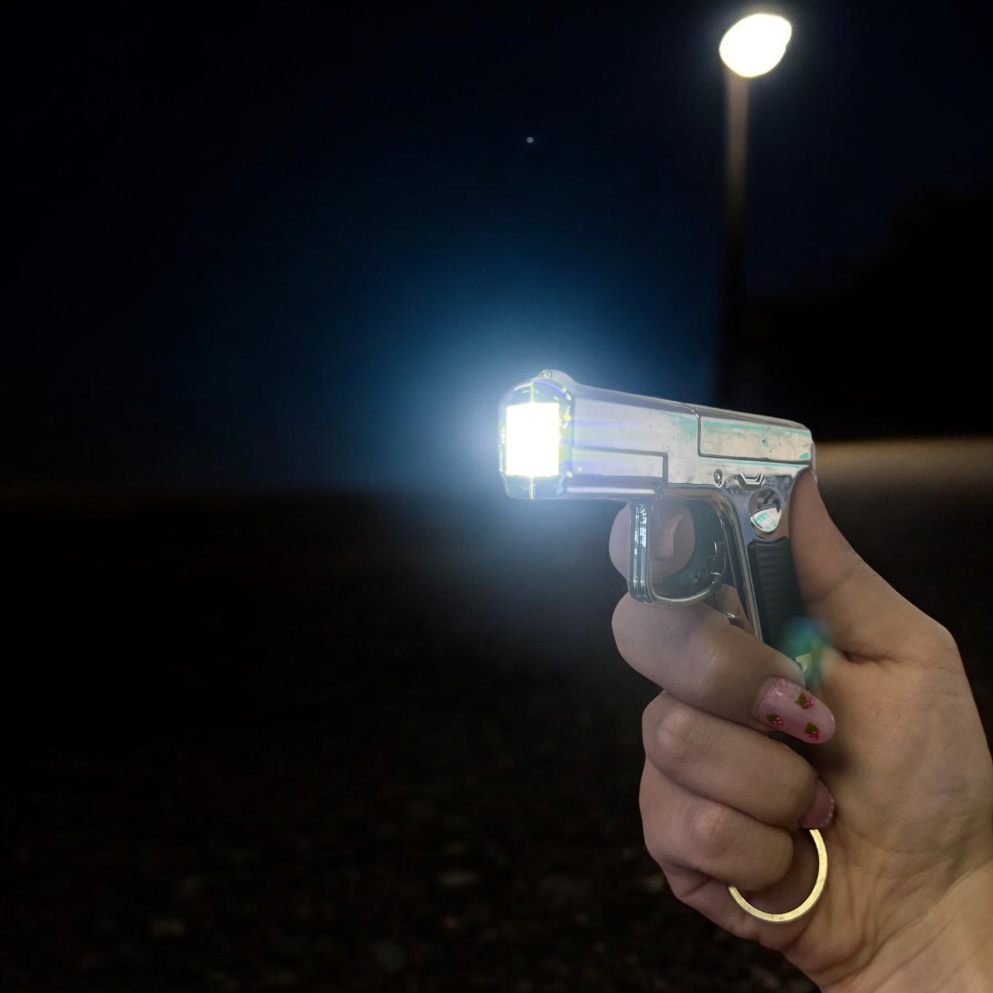 LLAVERO PISTOLA CON LUZ LASER